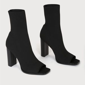 Black knit peep-toe sock boots